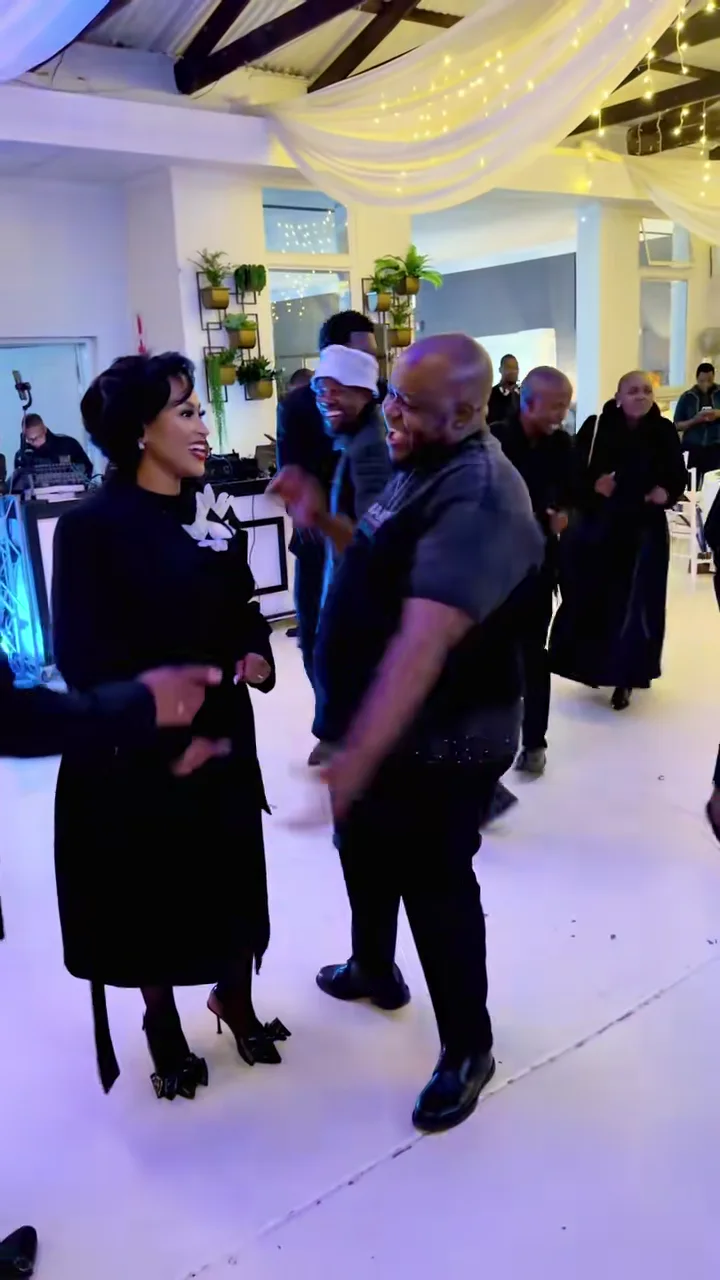 Oscar and Thandeka dancing at a wedding